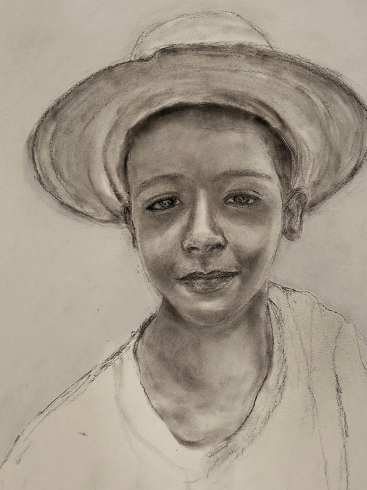 Boy with his straw hat