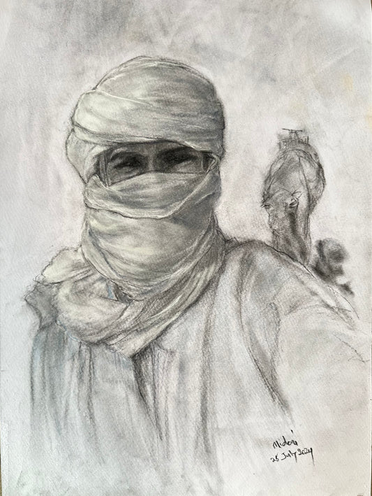 A nomad man in white chéche